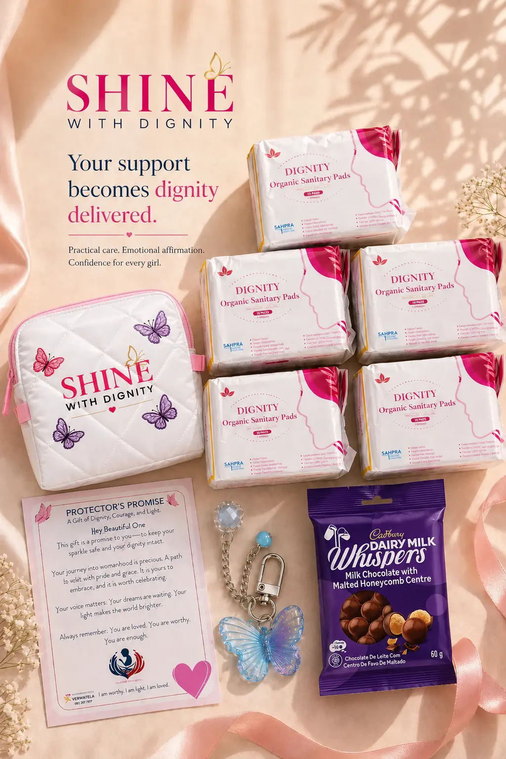 The contents of a SHINE With Dignity Pack laid out: Dignity Organic sanitary pads, a SHINE-branded reusable pouch, a Protector&rsquo;s Promise card, a butterfly keyring and a chocolate treat